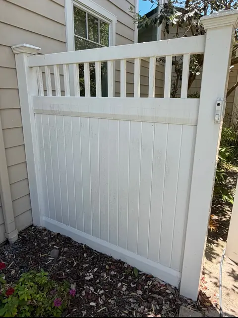 Vinyl fence after cleaning, photo by Gretchen T.